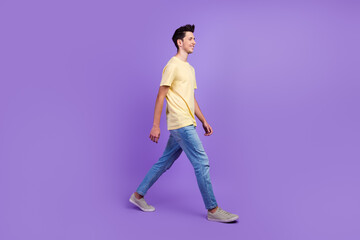 Full size photo of positive cheerful man have free time go walk wear casual style clothes isolated vivid color background