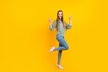 Fototapeta na wymiar Full body photo of excited lady have fun say hello make v sign isolated over vivid shine color background