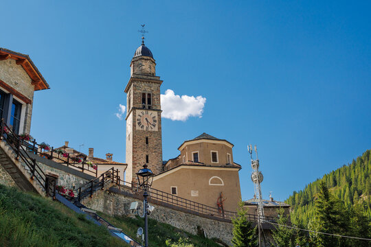 View of the Stone Bell Tower of the Church of Cogne in Aosta - Italy