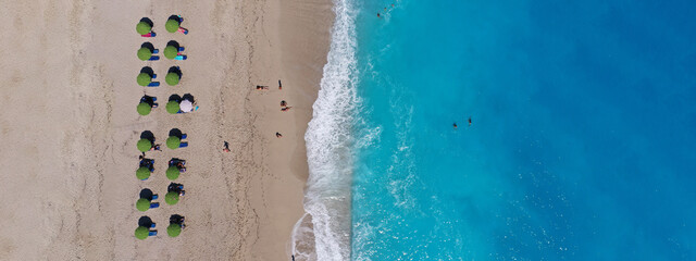 Fototapeta na wymiar Aerial drone ultra wide panoramic top down photo of famous paradise bay and beach of Kathisma with deep turquoise sea in island of Lefkada, Ionian, Greece