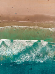 Top down view of survers and waves