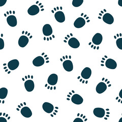 Vector seamless pattern with cute polar bear paw prints on snow