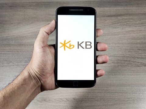 KB Kookmin Bank mobile app icon on phone screen.