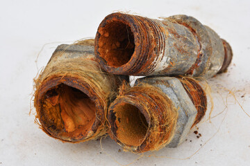 Water pipes with rust and limestone