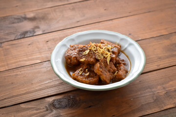 Semur Tempe or Tempeh stew, family favorite dish. Has a sweet and savory taste. Tempeh cooked with soy sauce, then served with a sprinkle of fried onions.
