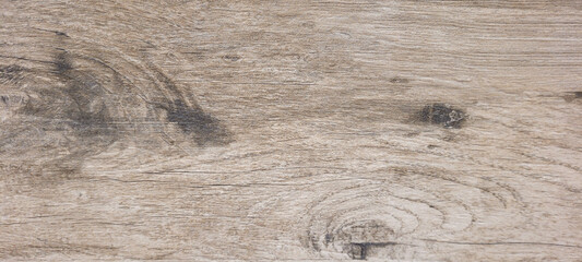 light rustic wood background with dark veins on natural panel