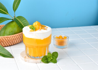 King Mango Thai is a mango juice drink from Thailand combined with whipped cream and yogurt, served...