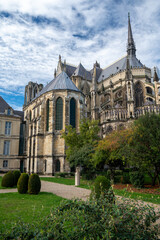 Fototapeta premium View from back side on gothic Roman Catholic cathedral church Notre-Dame in central part of old French city Reims, France