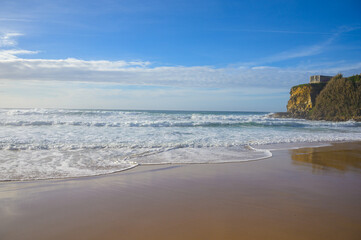 Magoito Beach at sunset, beautiful sandy beach on Sintra coast, Lisbon district, Portugal, part of...