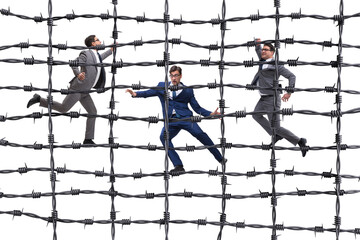 Businessman in barbed wire concept