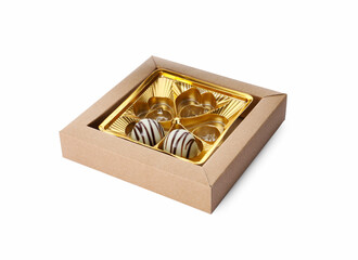 Partially empty box of chocolate candies isolated on white