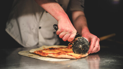 Chef preparing pizza