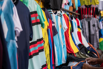 Calcutta, India - November 15, 2022. soccer jerseys are hanging in retail shop