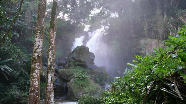 A beautiful waterfall in the tropical jungle in Asia