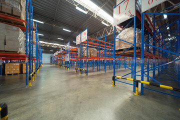 Fototapeta na wymiar Interior of large warehouse retail store industry. Rack of furniture and home accessories stock storage. Interior of cargo in ecommerce and logistic concept. Depot