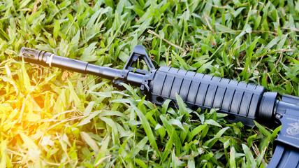 Air soft gun tip put on the grass