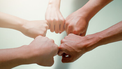 Team hands connect strategy teamwork business people problems Different but compatible business...