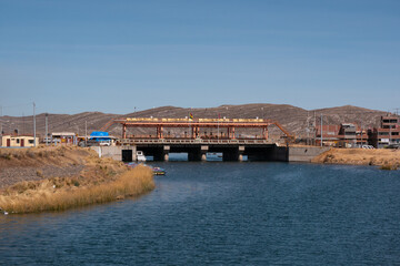 Fototapeta na wymiar Bridge Linking the Countries of Peru and Bolivia over Lake Titicaca