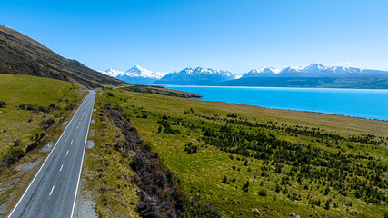 Aerial view of Landscape view of  mountain range near Aoraki Mount Cook and the road leading to Mount Cook Village in New zealand