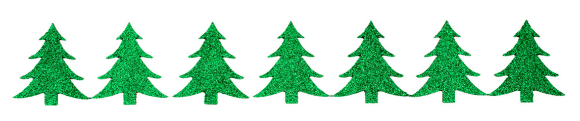 Row of small green glitter Christmas trees, celebrating winter holidays
