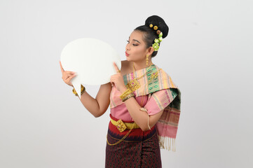 Young beautiful woman in Thai lanna costume with blank speech bubble sign