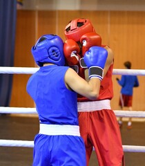 Boys fighter compete in boxing - obrazy, fototapety, plakaty