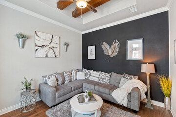A luxury living room with a stone fireplace