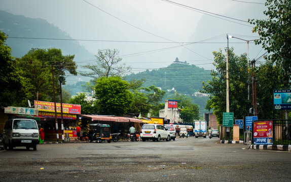 July 5th 2022 Katra, Jammu and Kashmir, India. Local Market at katra city in Jammu And Kashmir with a distant hindu temple in the mountain peak.