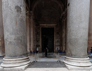 THE MAJESTIC COLUMNS AND THE ENTRANCE OF THE PANTHEON OF ROME