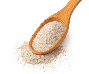 Raw rye flour in the wooden spoon, isolated on white background.