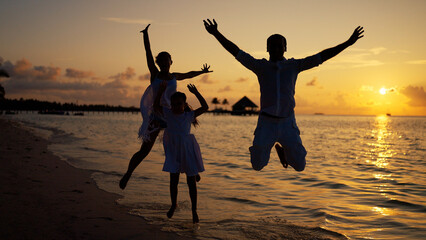 Happy Family Beach Fun In Summer In Sunset