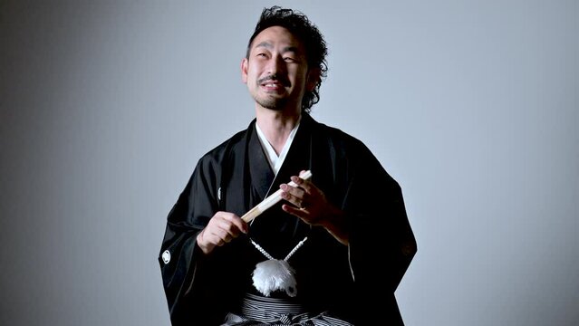 Image like a Japanese 「rakugo」 storyteller.　