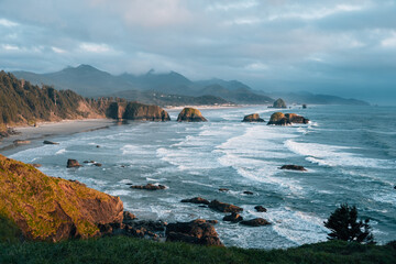 Enola State Park, Cannon Beach heystack rock reflects on the beach in oregon