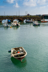 vertical view of the Folkestone Harbour with many boats at anchor