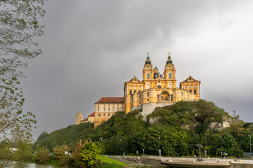 Fototapeta na wymiar the historic Melk Abbey and church spires on the rocky promontory above the Danube River