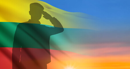 Silhouette of saluting soldier with the flag of Lithuania on background of sunset. Armed forces of Lithuania. Greeting card - Armed Forces day