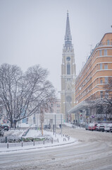 Fototapeta na wymiar The streets of the city of Novi Sad are covered with snow.