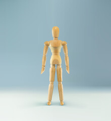 Wooden figure. figurine isolated on blue background. Puppet concept. Wood dummy. Wooden man.