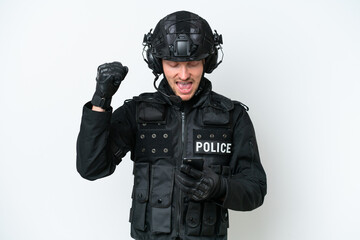 SWAT man over isolated white background with phone in victory position