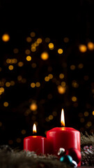 Two burning red candles on the New Year's table