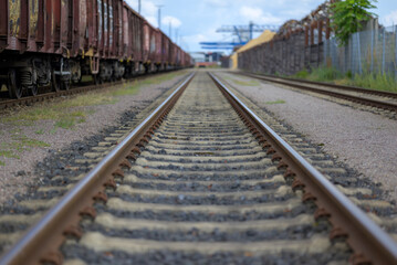 Fototapeta na wymiar Empty train tracks in a low angle view