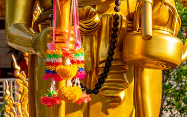 Detail on a Buddha statue at a temple in Mae Sot Thailand