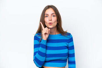 Fototapeta premium Young caucasian woman isolated on white background intending to realizes the solution while lifting a finger up