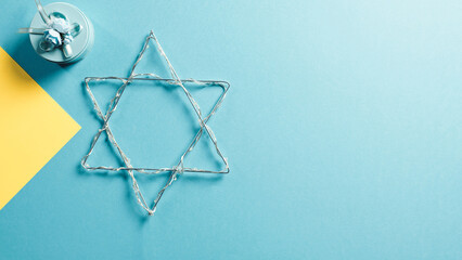Hanukkah David star symbol with blue background