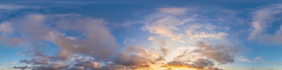 Fototapeta premium Dark blue sunset sky panorama with pink Cumulus clouds. Seamless