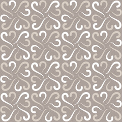 Seamless tile pattern in traditional style. Simple abstract spiral shapes. Flat vector graphics.