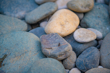 Fototapeta na wymiar the texture of pebbles on the black sea