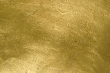 Brass plate background texture. Gold scratched surface.