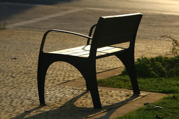 Bench for rest in a city park in Israel.