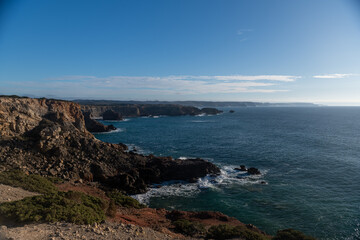 Fototapeta na wymiar Beautiful rocky coastline and blue sea in Portugal